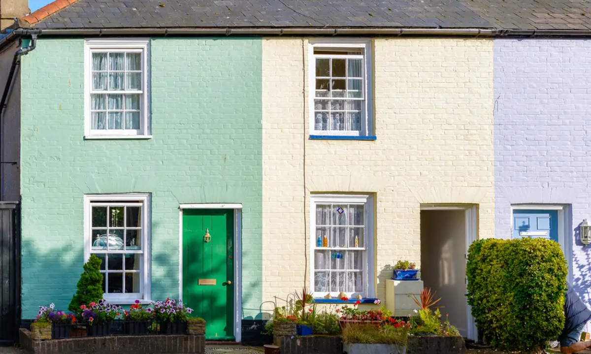 Close-up of terrace of pastel-coloured holiday lets