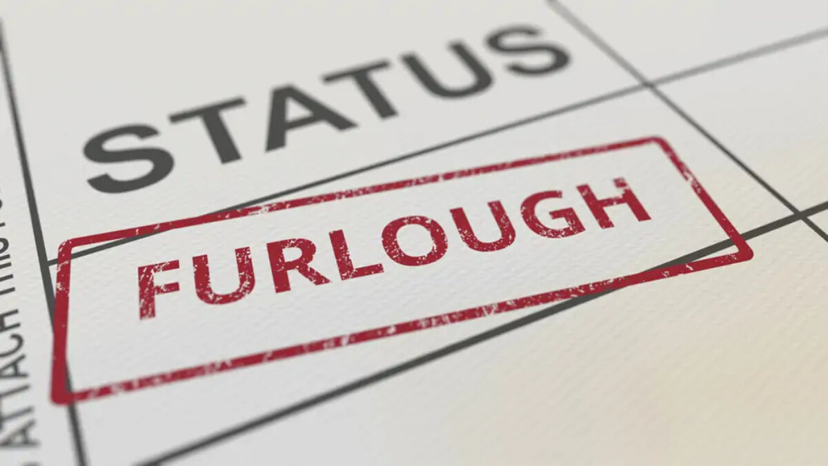 Red furlough stamp on paper form