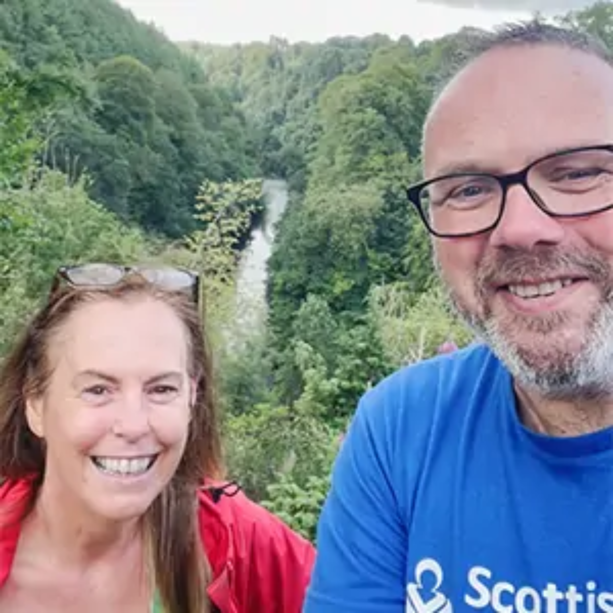 Selfie of Benson Wood & Co Chartered Accountants CEO John Moffat wearing Scottish Huntington's Association t-short and friend during charity walk