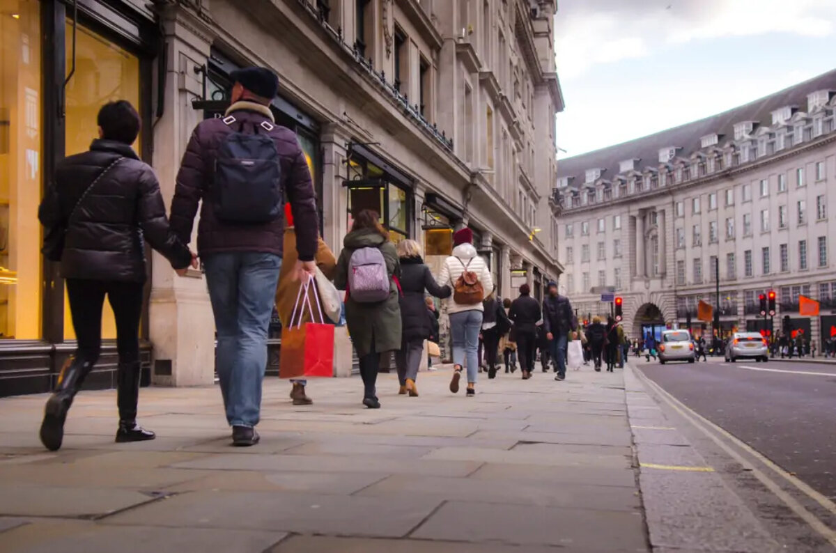 Shoppers walking on street