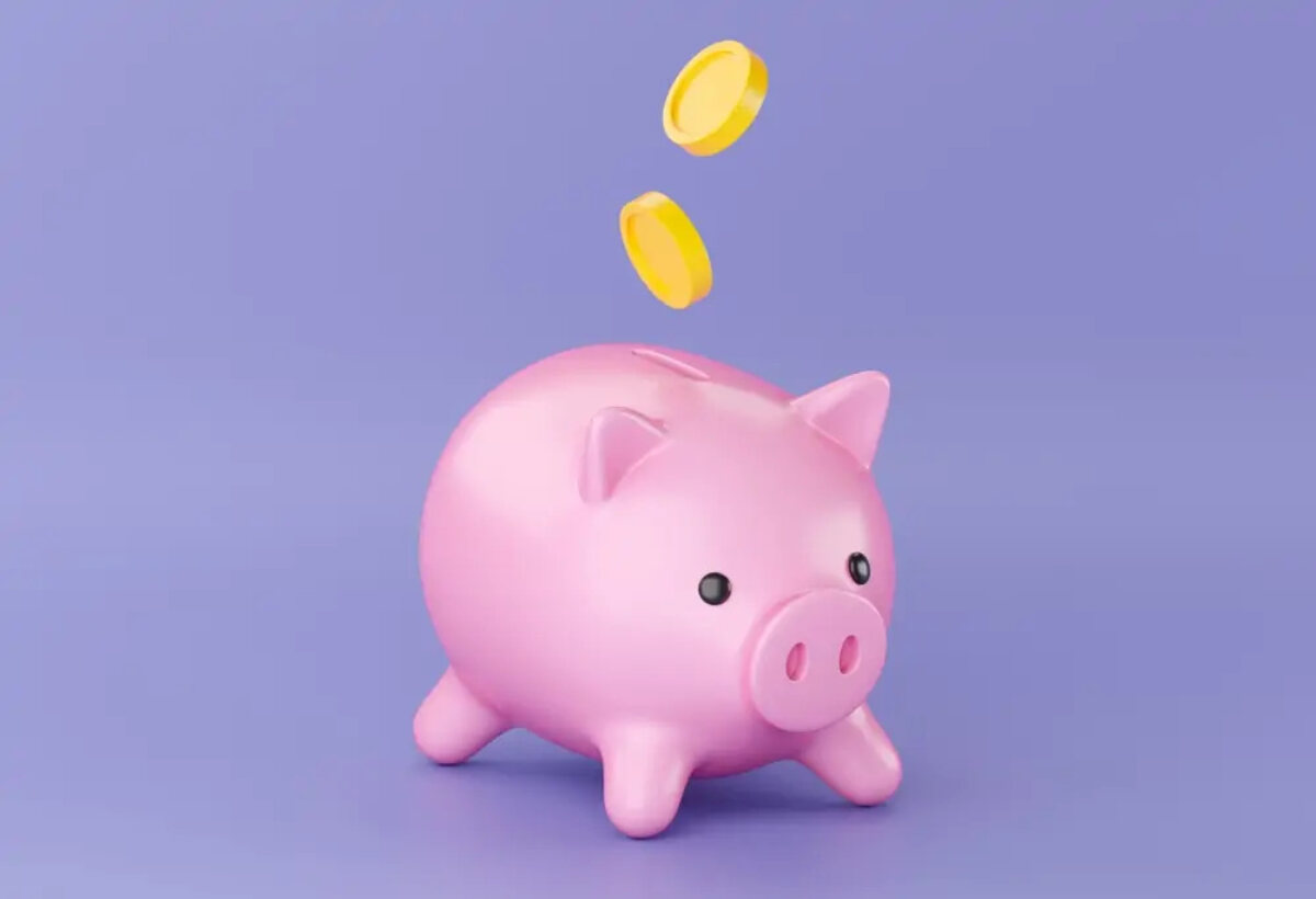 Cartoon piggy bank with two coins falling into slot