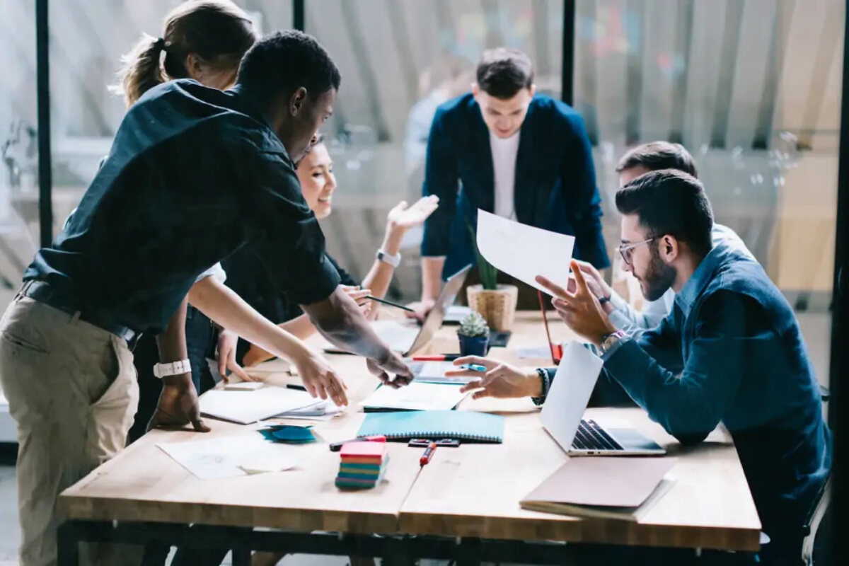 Six businesspeople in a meeting
