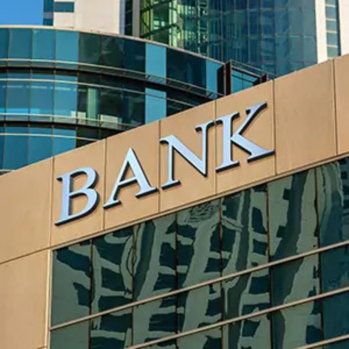 'Bank' sign amongst city office buildings
