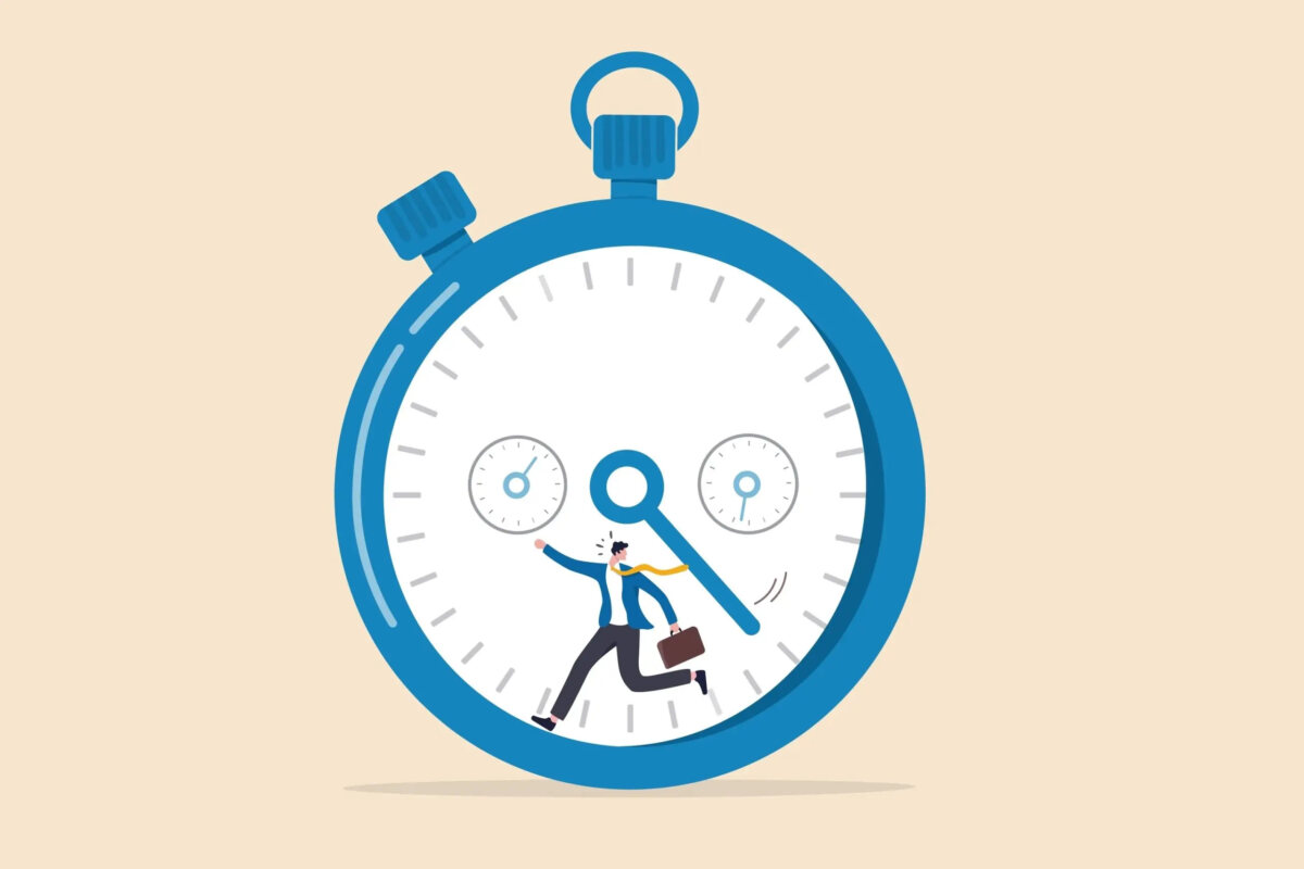 Cartoon of miniature businessman inside stopwatch running from approaching clock hand