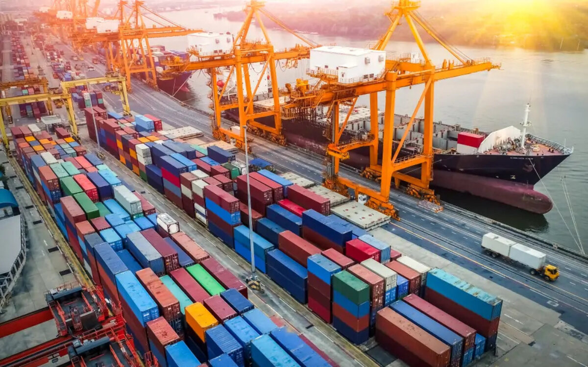 Containers stacked at cargo ship port from above