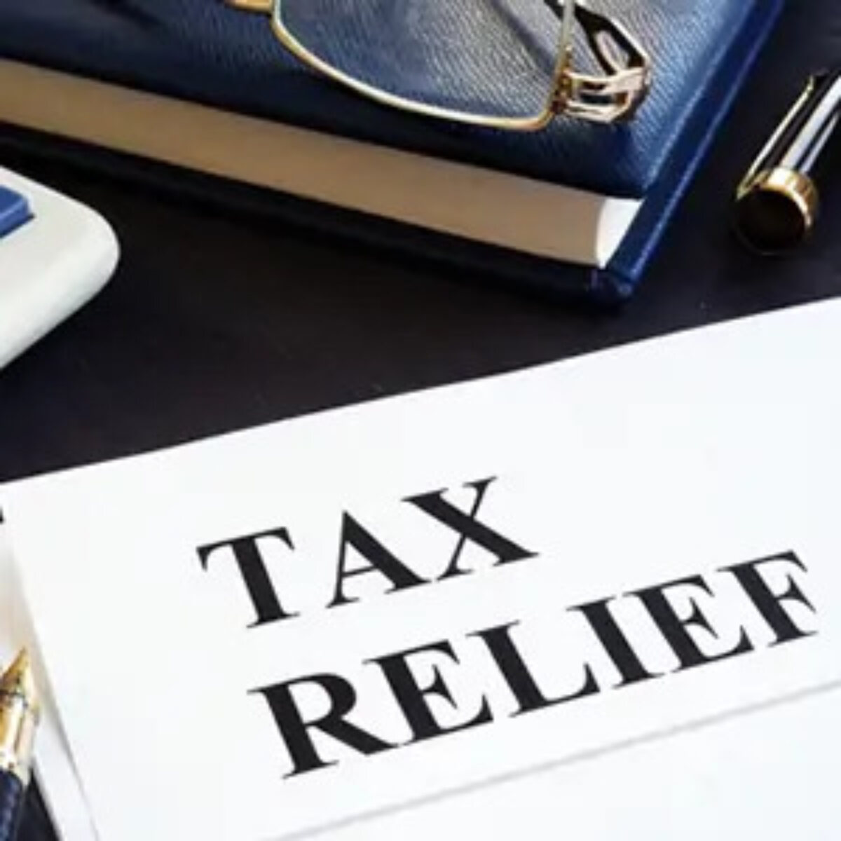 Document with header 'tax relief' on desl