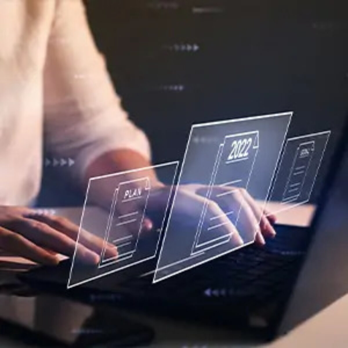 Businesswoman at desk overlayed with images of document files