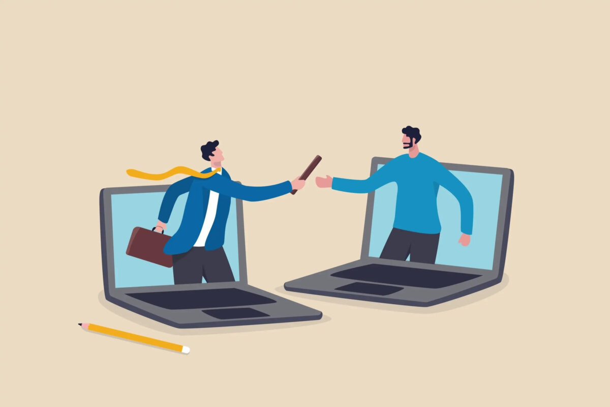 Cartoon of two laptops with businessmen coming out of screens, one handing a baton to the other