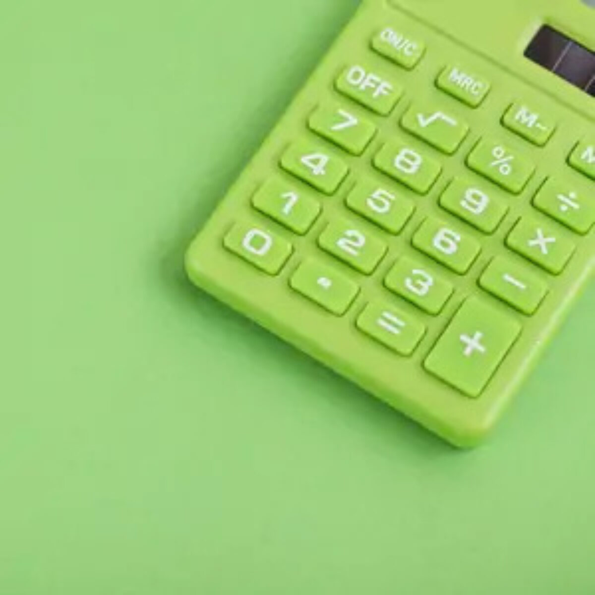 Green calculator keypad on green background