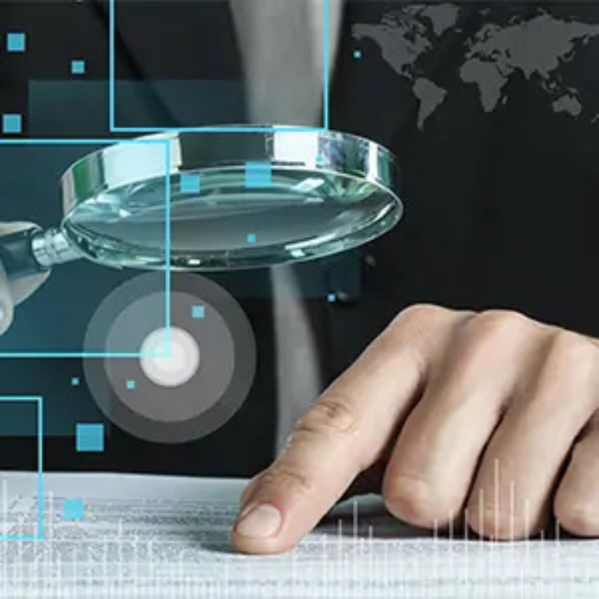 Businessman looking through magnifying glass at finger pointing at document overlayed with technology graphics