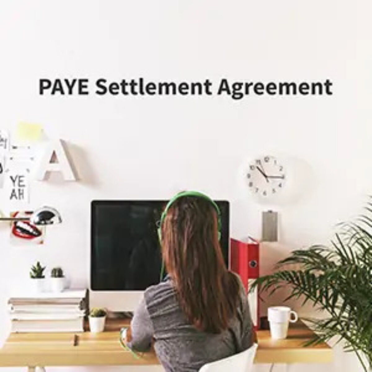Woman wearing headphones sat in front of desktop with 'PAYE settlement agreement' text above