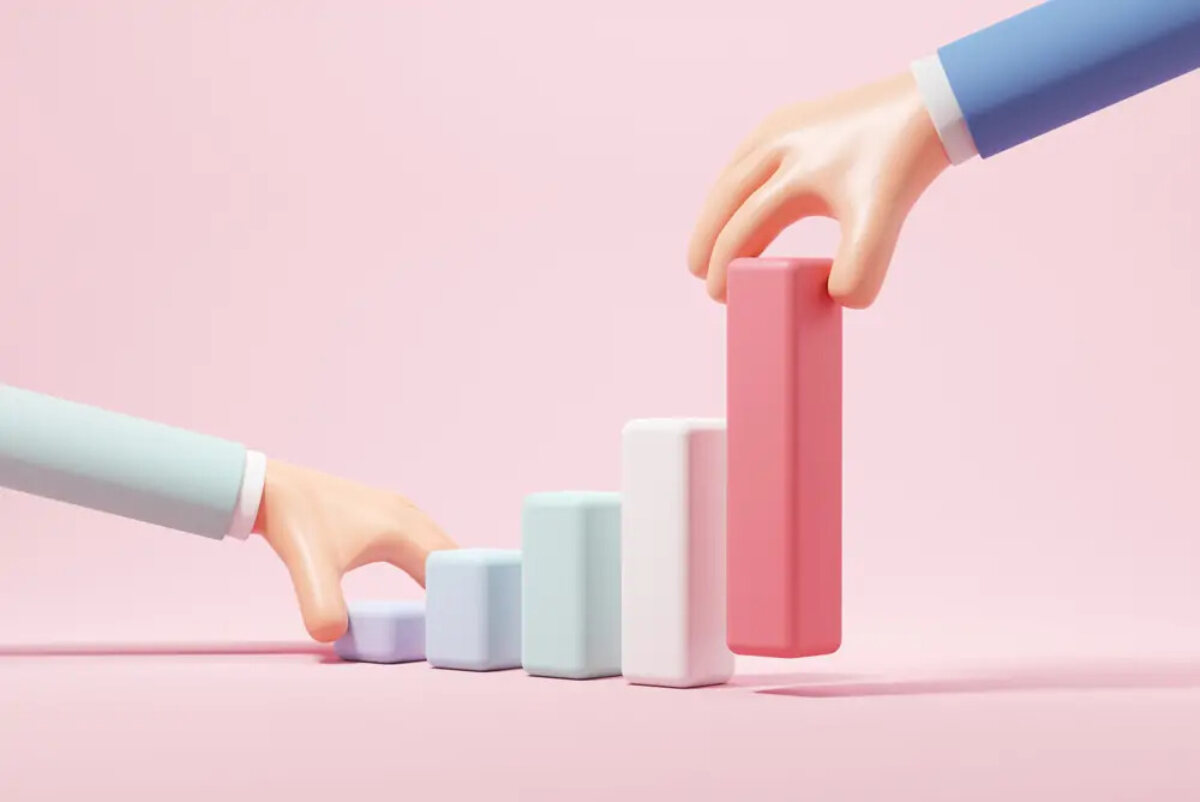 Cartoon of two hands placing down blocks to form an increasing bar chart