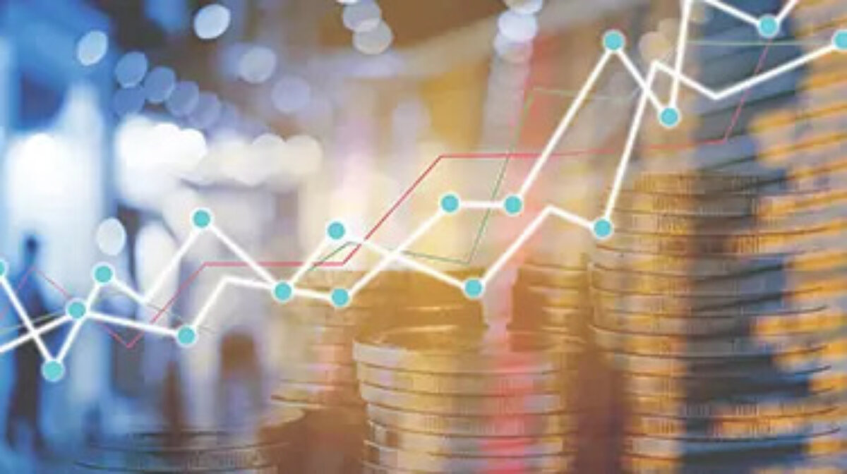 Increasing graph lines in front of stacks of coins
