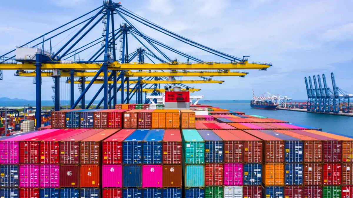 Close-up of containers on a cargo ship at a port
