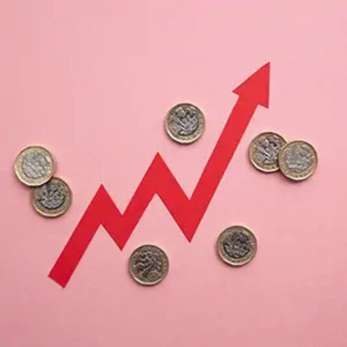 Arrow pointing upwards with pound coins on either side