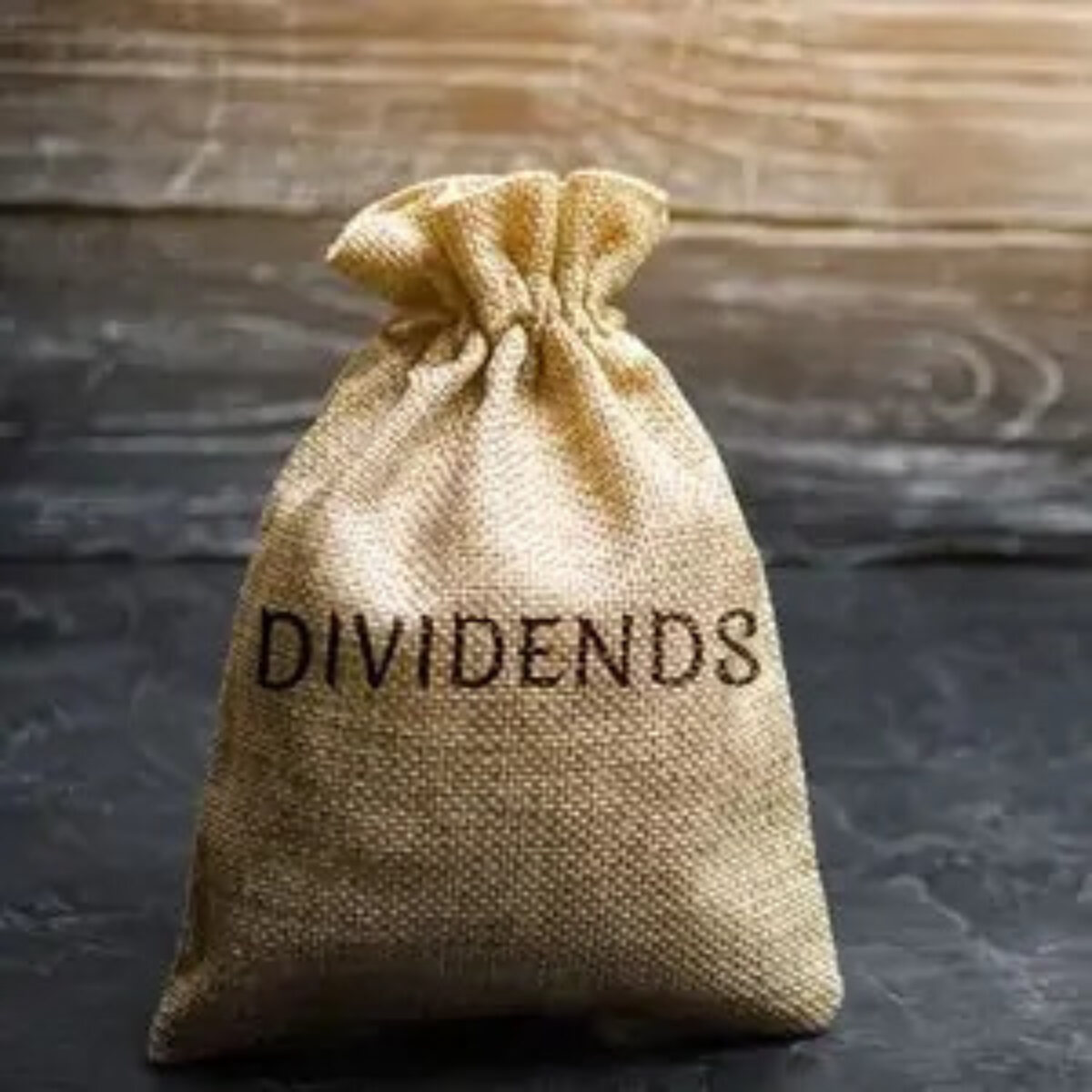 Sack on floor with 'dividends' on front