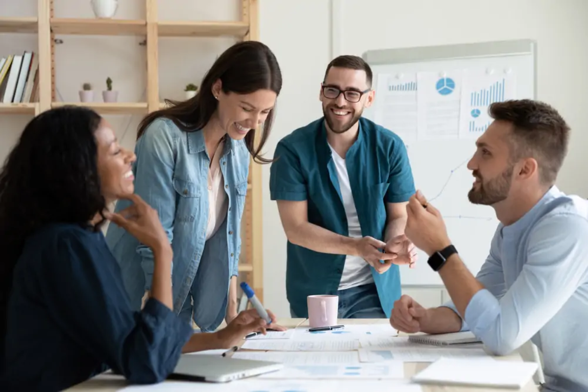 Businesspeople laughing in meeting