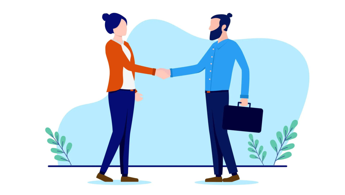 Cartoon of two businesspeople standing shaking hands