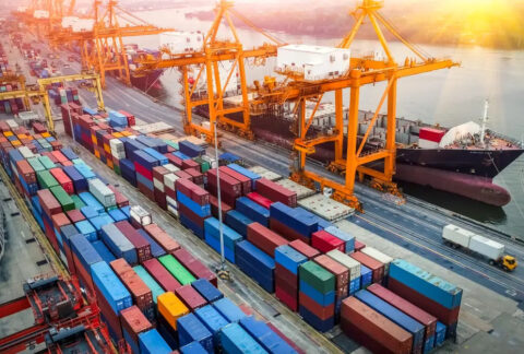 Containers stacked at cargo ship port from above