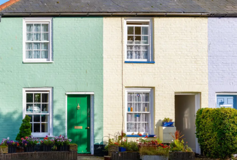 Close-up of terrace of pastel-coloured holiday lets