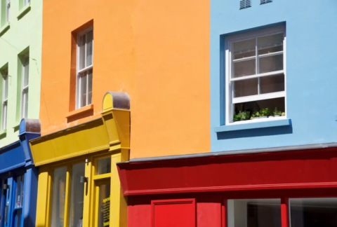 Closeup of brightly-coloured shopfronts