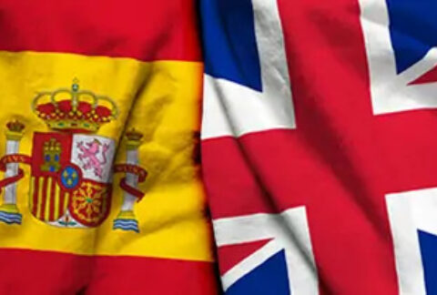 Spanish flag and British flag next to each other