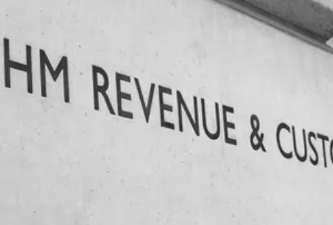 Brick of a building with 'HM REVENUE & CUSTOMS' engraved on it