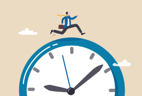 Cartoon of miniature businessman holding briefcase and running on top of clockface