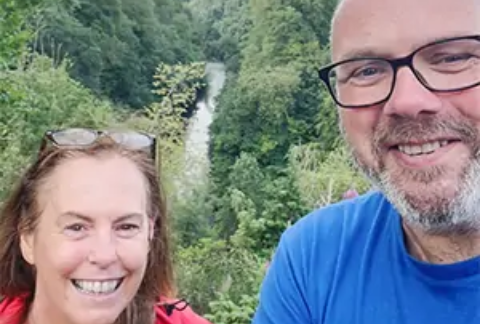 Selfie of Benson Wood & Co Chartered Accountants CEO John Moffat wearing Scottish Huntington's Association t-short and friend during charity walk