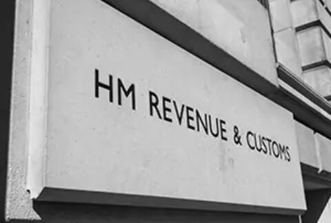 Brick of a building with 'HM REVENUE & CUSTOMS' engraved on it