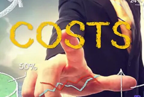 Businesswoman pointing at the word 'costs' surrounded by graph images