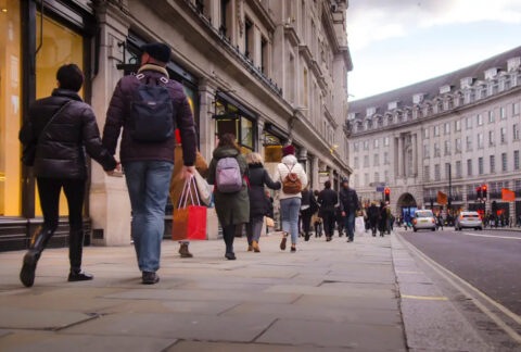 Shoppers walking on street