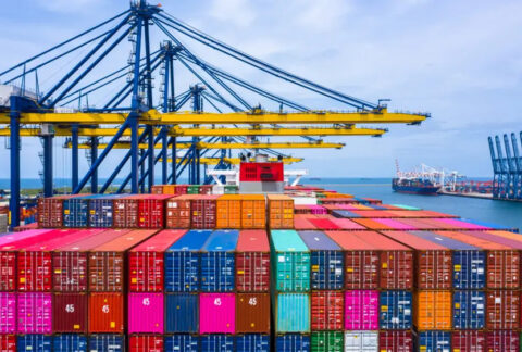 Close-up of containers on a cargo ship at a port