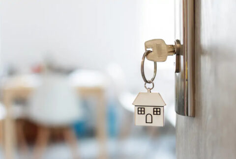 Key in lock with a house keyring attached