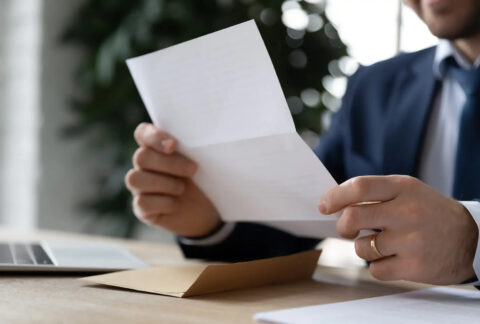 Businessman reading a letter