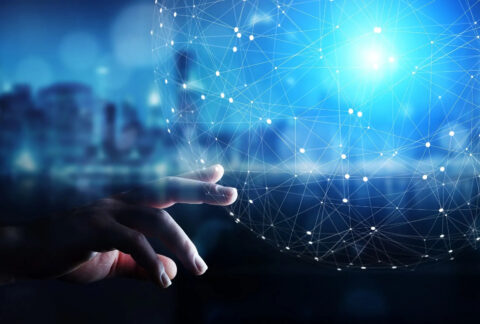 Hand touching image representing global network