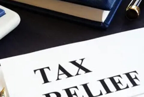 Document with header 'tax relief' on desl